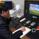 Korean government official checks the direct communications hotline to talk with the North Korean side at the border village of Panmunjom